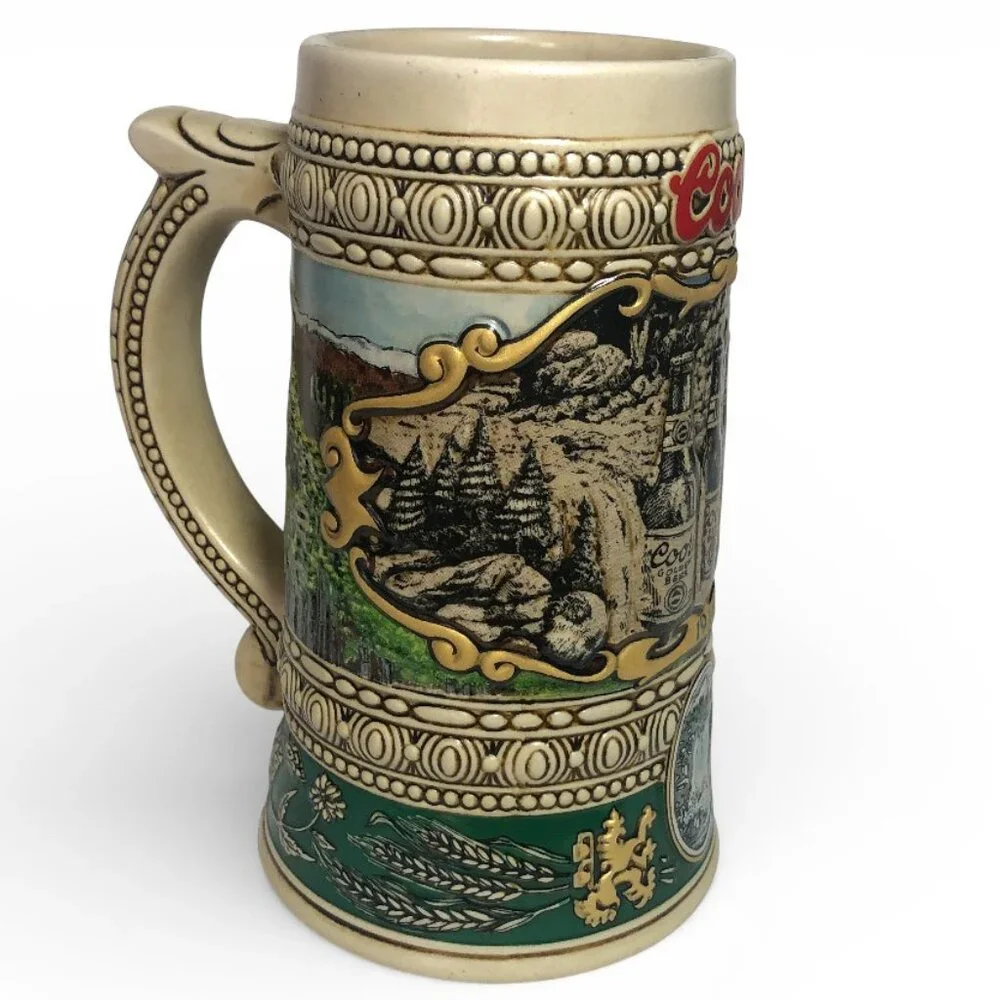 1990 Edition Coors Beer Vintage Stein showing bottles near a waterfall